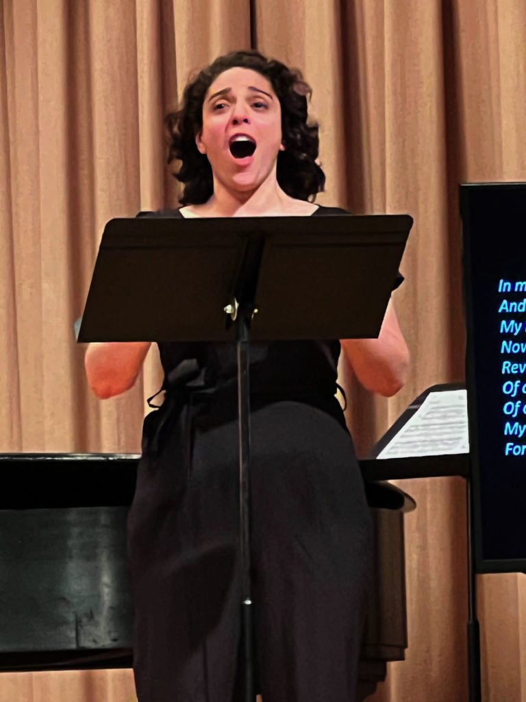 photo of Shari Eve Feldman singing